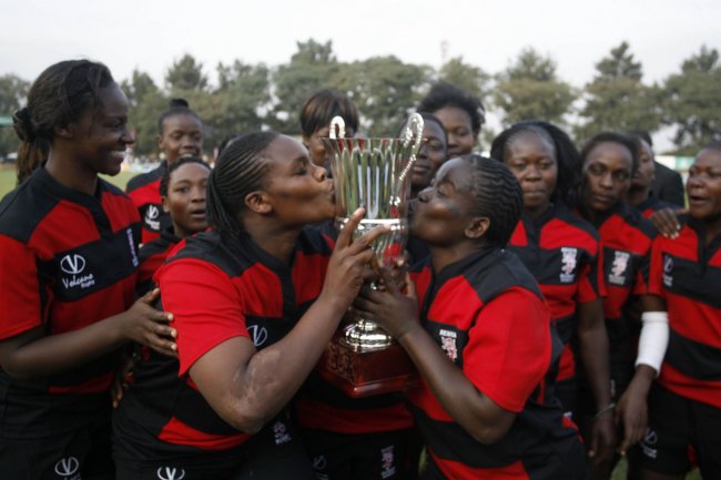 The late Abedeen Shikoyi holding the trophy (right).(Photo:File)
