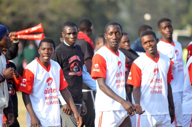 Laiser Hill Academy players walk off the pitch after their match against Upper Hill was called off because of 'security' concerns. (Photo by Shutterspeed)