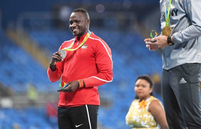 Julius Yego on the podium with his Silver medal from the men's Javelin.(Photo by Norman Katende)