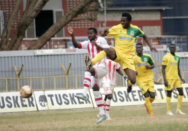 Mathare United's Edward Seda battles for possession against Kakamega Homeboyz' Erick Ambunya in a previous match. They face Sofapaka on Wednesday. (Photo by Shutterspeed)